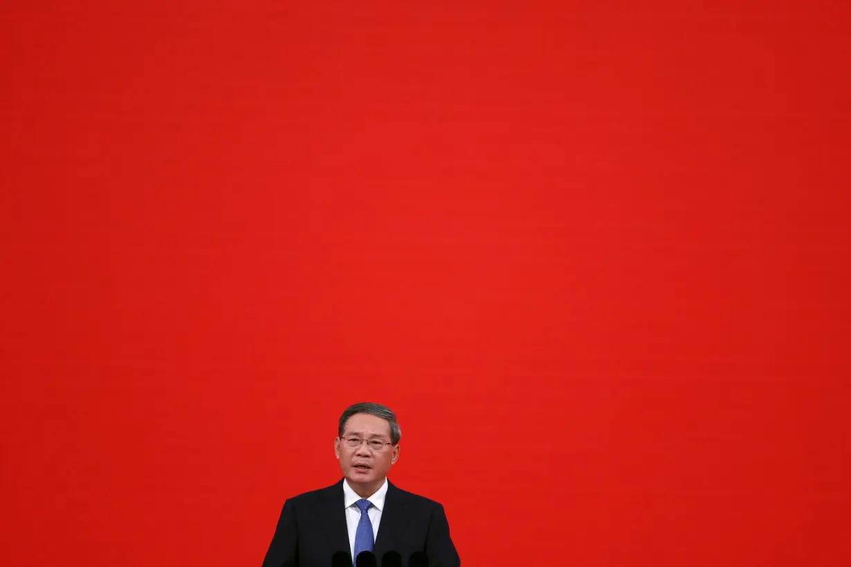 FILE PHOTO: Chinese Premier Li Qiang speaks at the China International Supply Chain Expo in Beijing