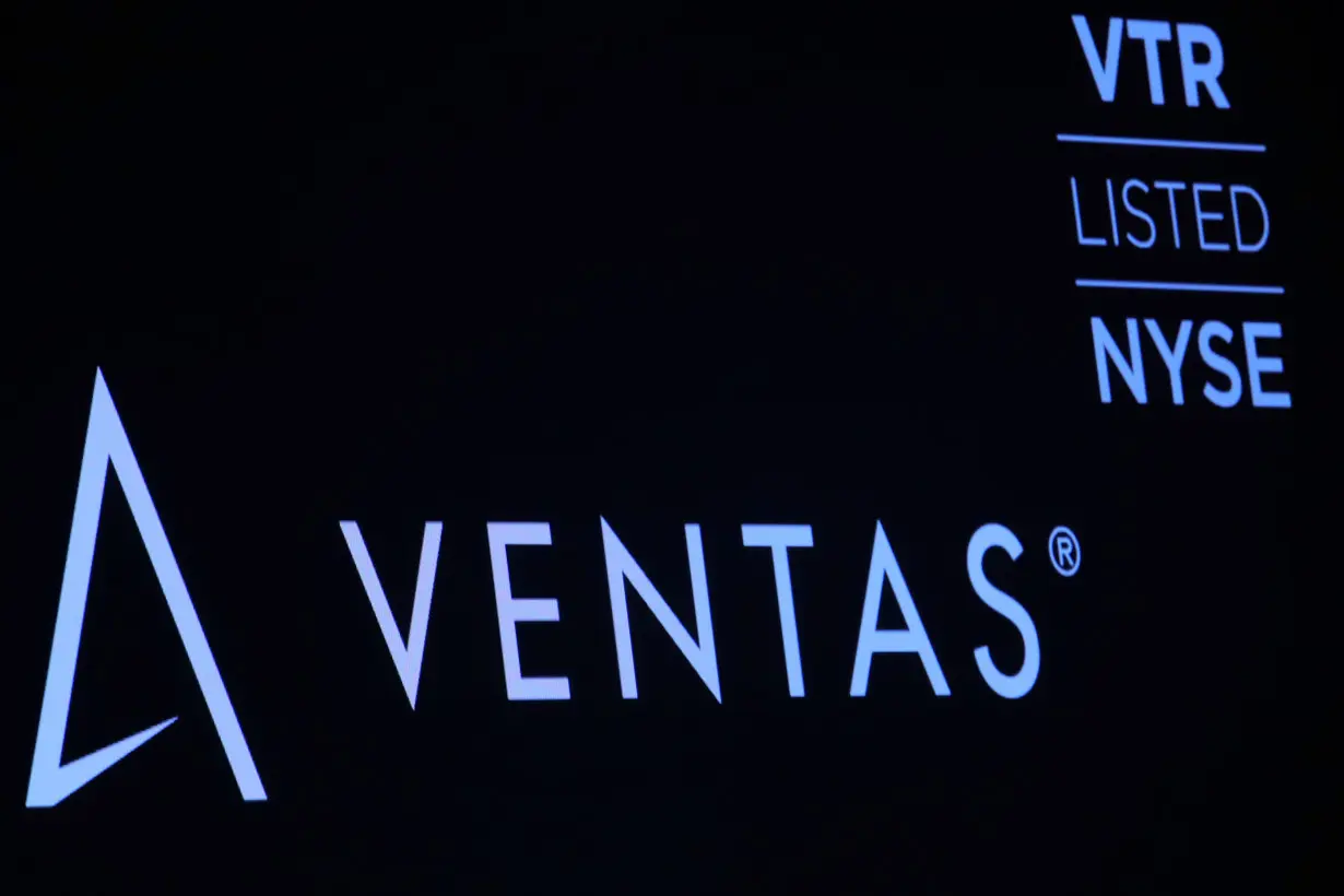 The logo for Ventas, Inc., a real estate investment trust, is displayed on a screen on the floor at the NYSE in New York