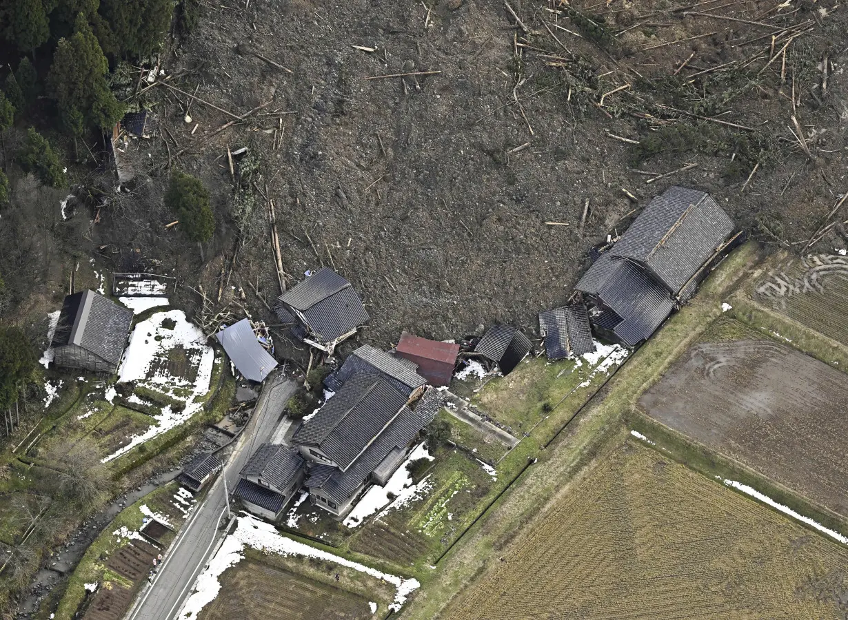 Scenes of loss play out across Japan's western coastline after quake kills 92, dozens still missing