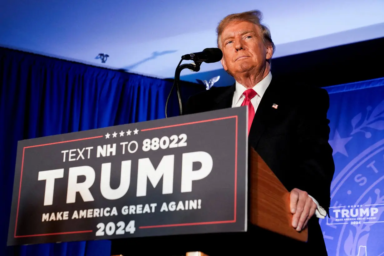 FILE PHOTO: Former U.S. President and Republican presidential candidate Trump holds a rally, in Portsmouth