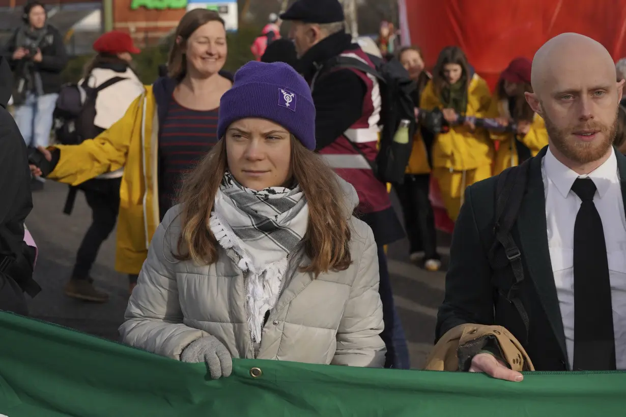 Greta Thunberg joins hundreds marching in England to protest airport's expansion for private planes