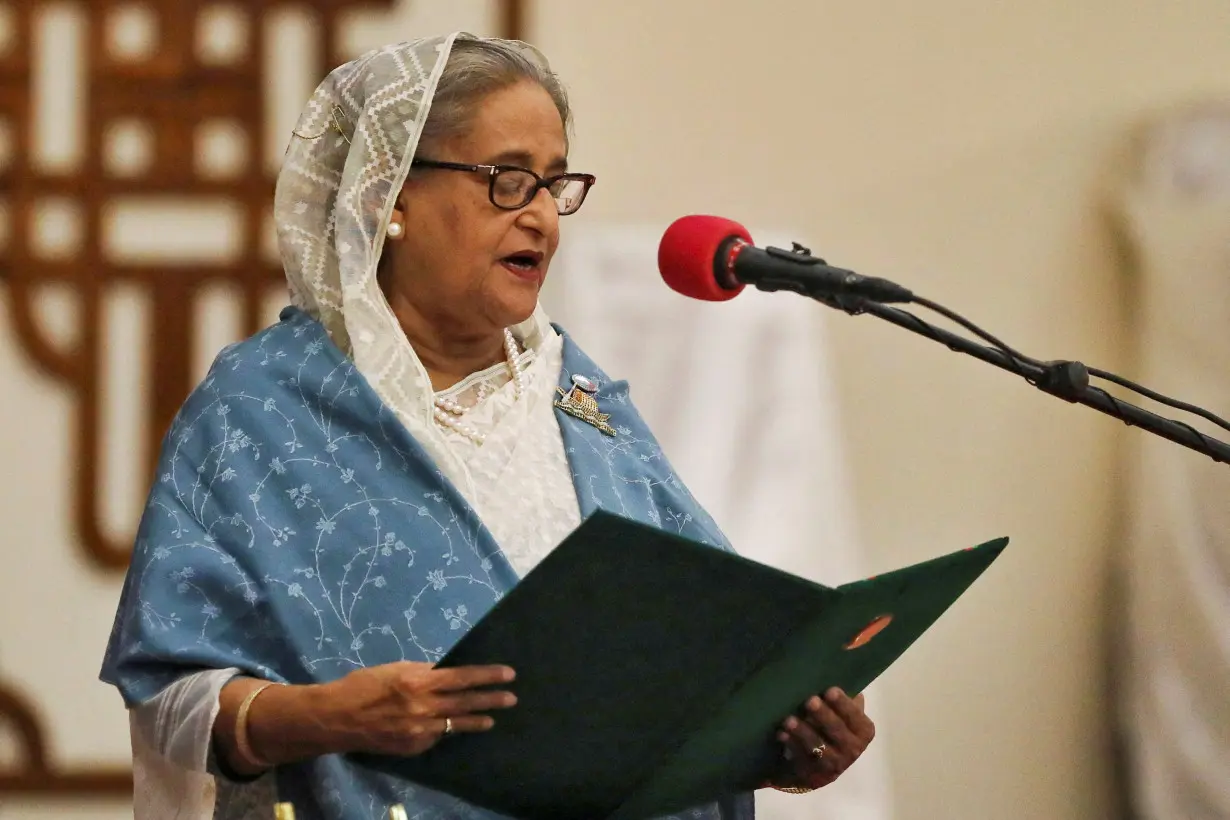 FILE PHOTO: Prime Minister Sheikh Hasina takes oath as the country's Prime Minister at the Bangabhaban in Dhaka