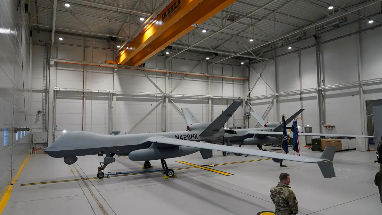 FILE PHOTO: A U.S. Air Force MQ-9 Reaper drone sits in a hanger at Amari Air Base