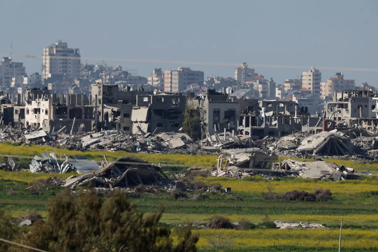 A view of damaged buildings in the Gaza Strip, as seen from southern Israel