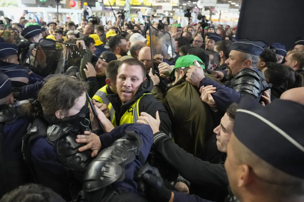 Macron booed by French farmers who blame him for not doing enough to support agriculture