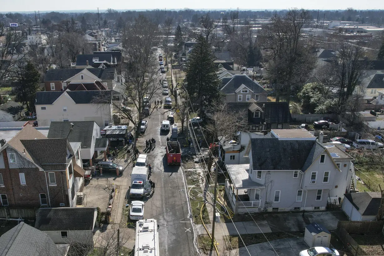 Investigators focus on suspect in Philadelphia area fire and shooting that left 6 dead, 2 hurt