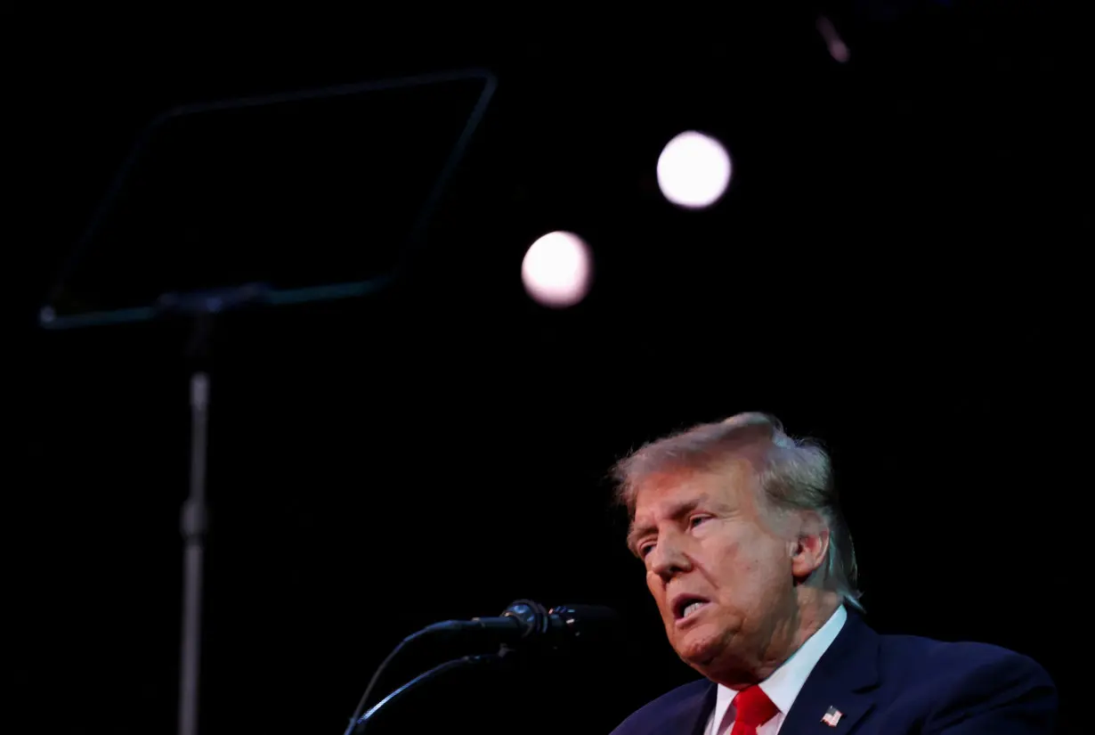 FILE PHOTO: Former U.S. President and Republican presidential candidate Trump holds a rally in Rochester