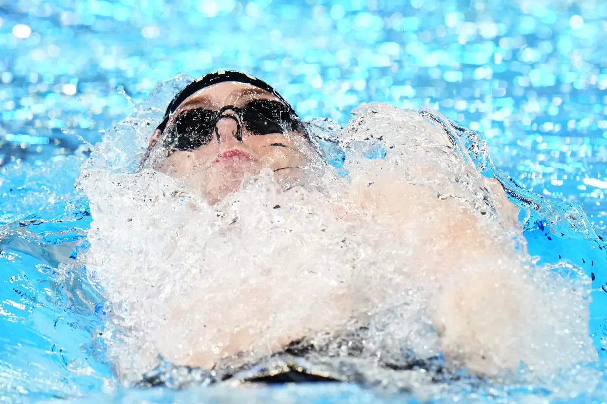 American Hunter Armstrong gets 2 more medals on final day of swim worlds. Israeli swimmer is jeered