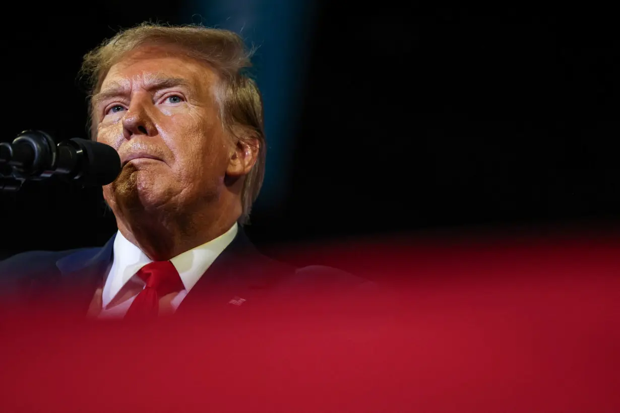 FILE PHOTO: Former U.S. President Donald Trump attends a campaign event in Conway