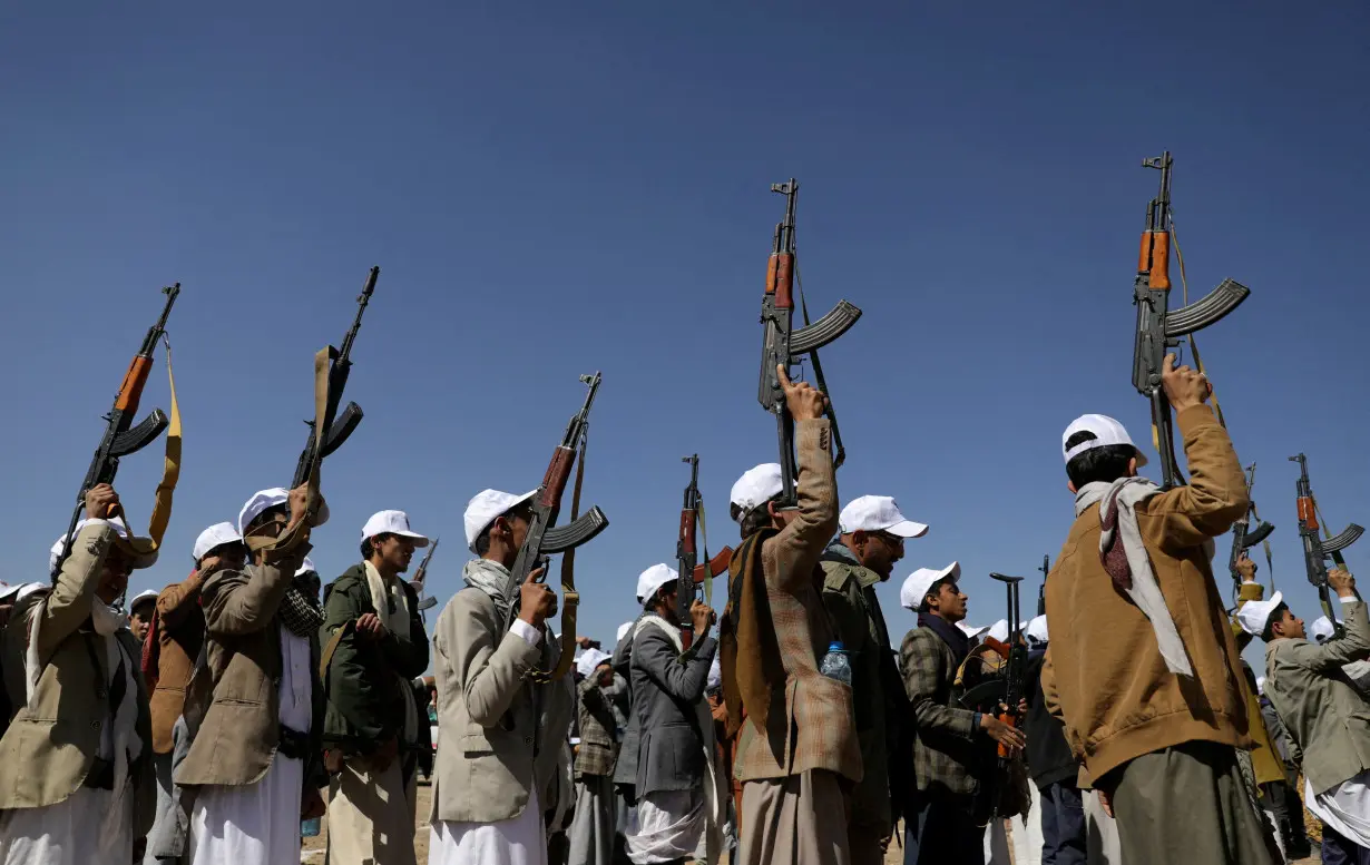 FILE PHOTO: Houthi followers protest near Sanaa