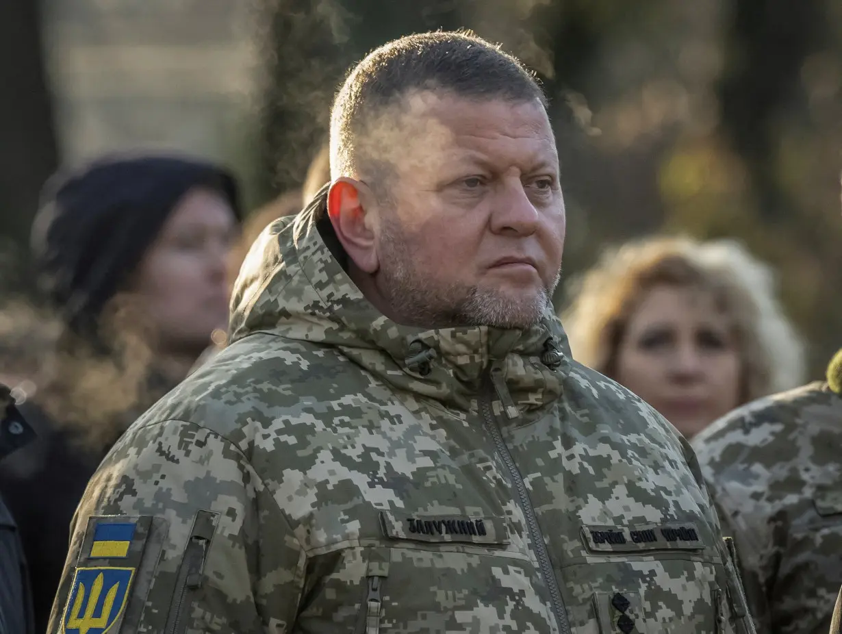 FILE PHOTO: Chief of the Ukrainian Armed Forces Zaluzhnyi visits a monument to Holodomor victims in Kyiv