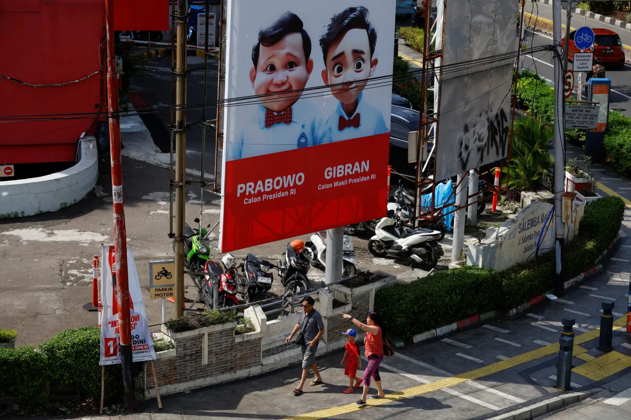 A billboard promoting Indonesia's Defence Minister and Presidential candidate Prabowo Subianto and his running mate Gibran Rakabuming Raka in Jakarta