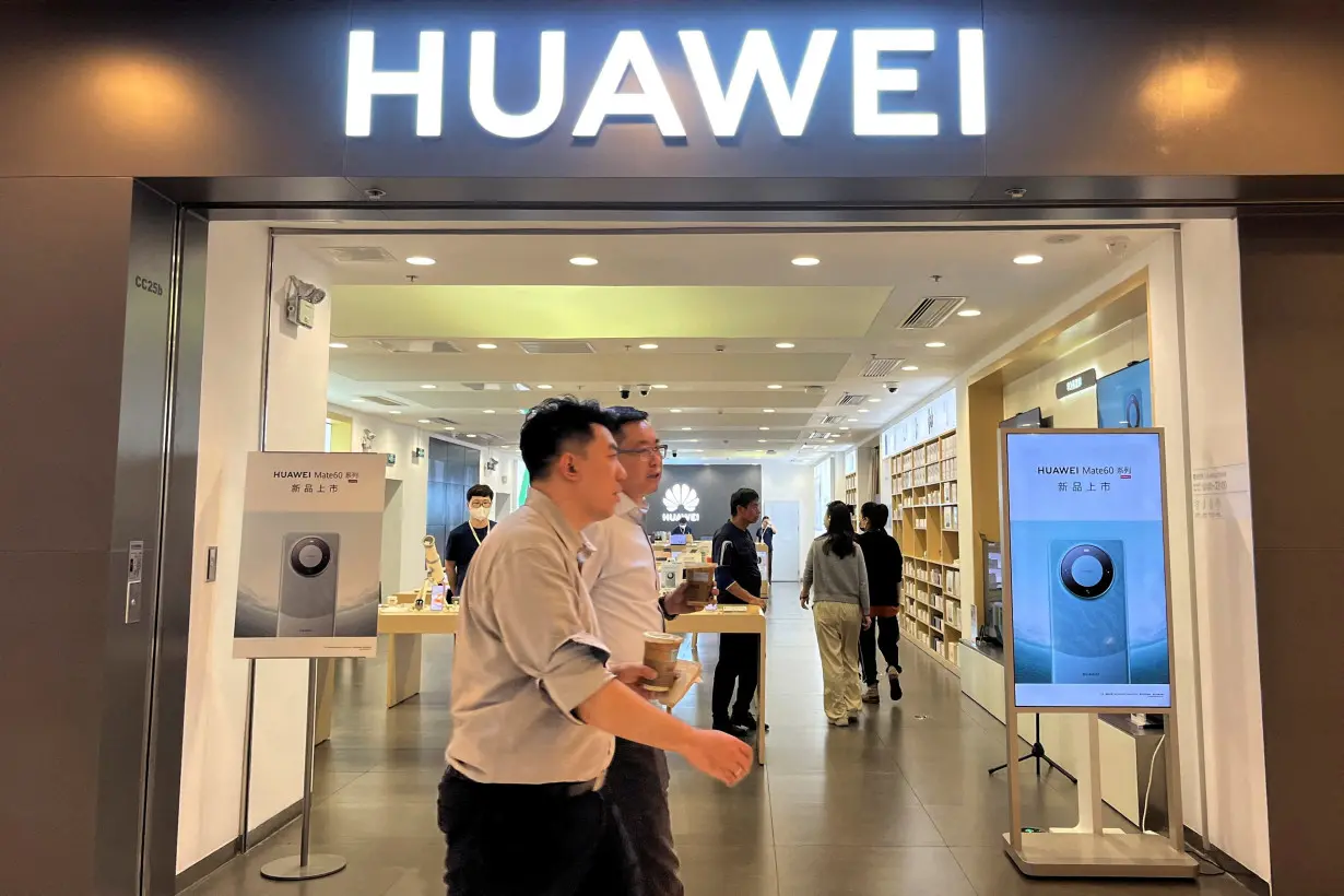 FILE PHOTO: Advertisements for Huawei Mate 60 in Beijing