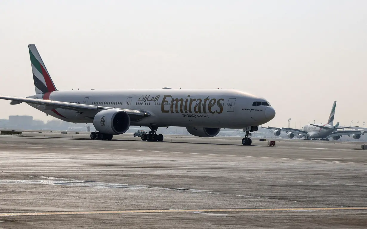 FILE PHOTO: An Emirates Airlines Boeing 777-300ER at Dubai airport