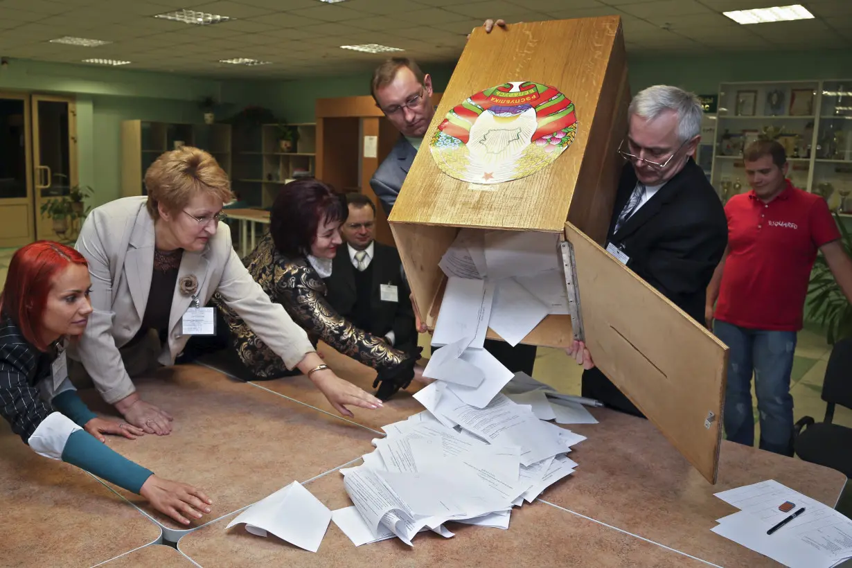 Belarusians vote in tightly controlled election amid opposition calls for its boycott