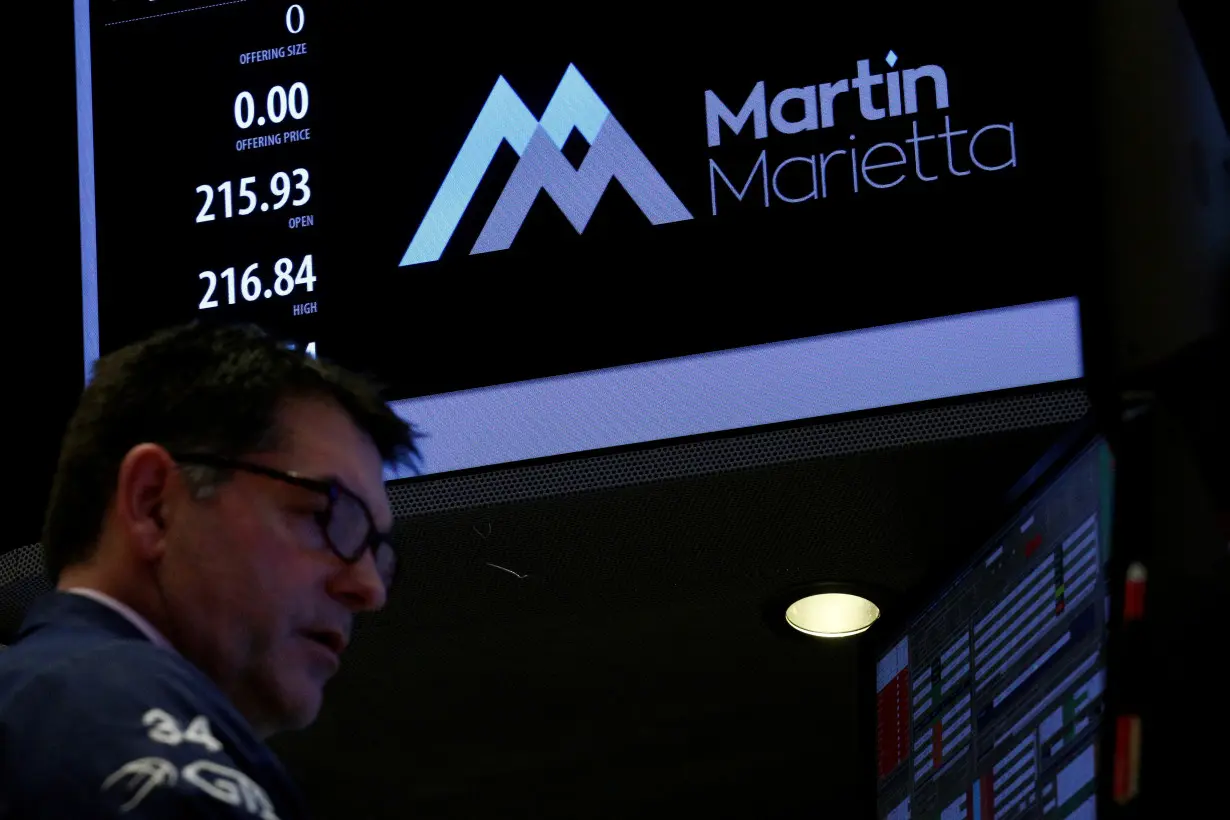 A specialist trader works at the post where Martin Marietta Materials is traded on the floor of the NYSE