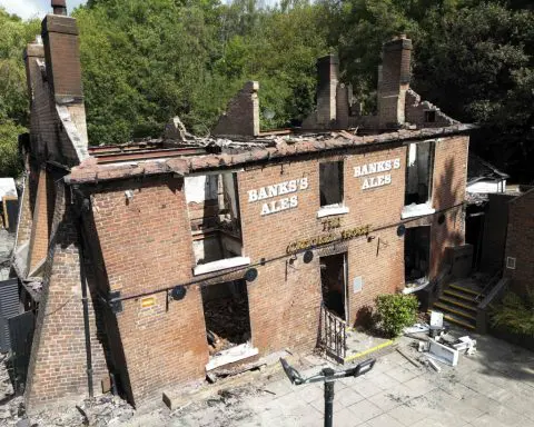 Cheers to being crooked again. Quirky English pub bulldozed after a fire to be rebuilt as it was