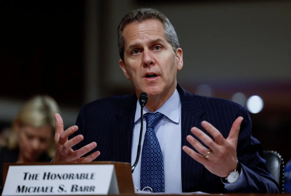 FILE PHOTO: Regulators testify before a Senate Banking hearing about recent bank failures on Capitol Hill in Washington