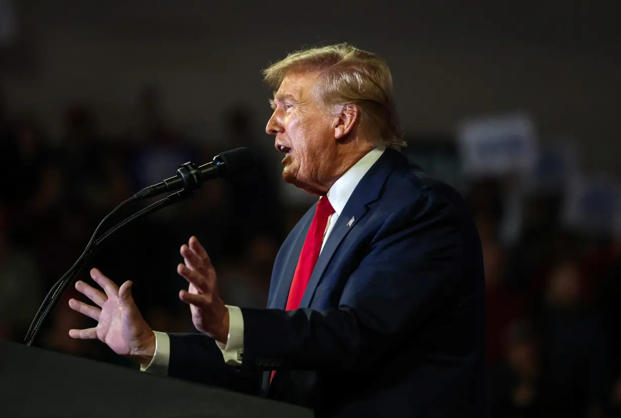 Former U.S. President Donald Trump attends a campaign event in Conway