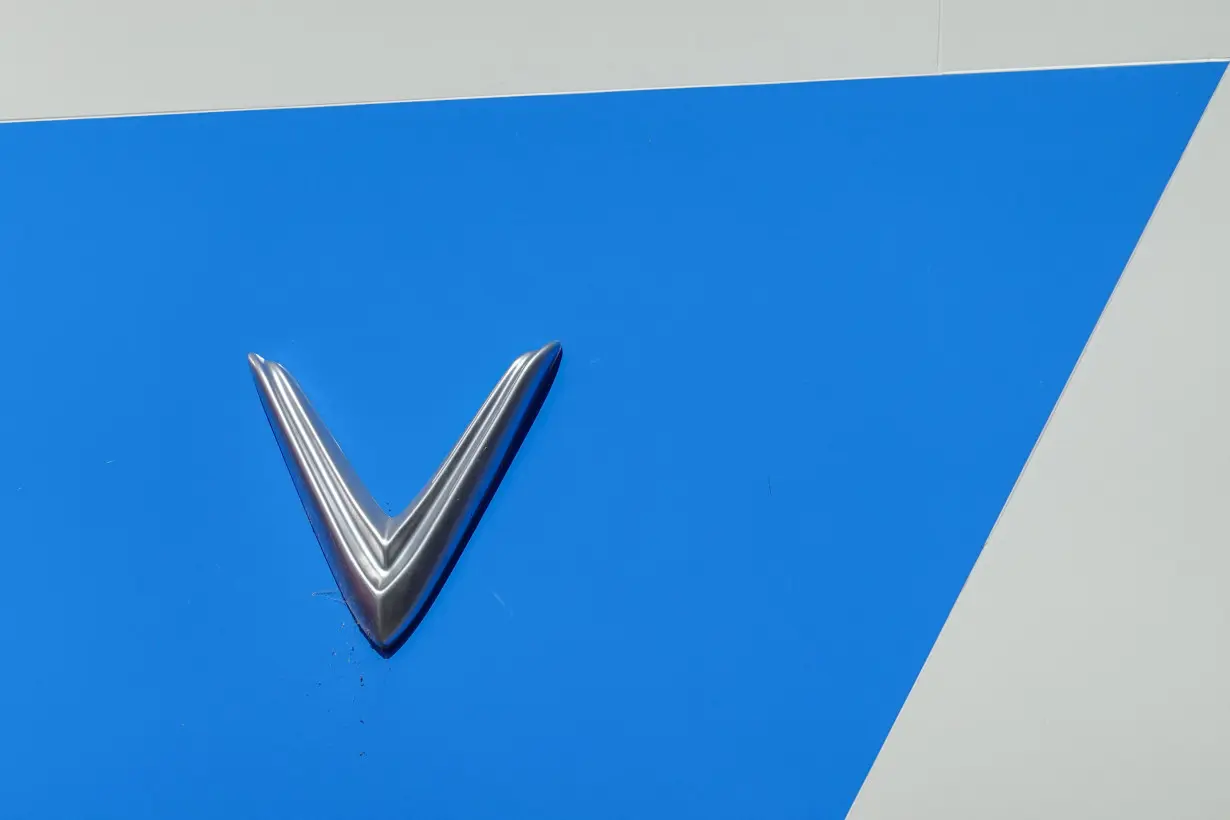 A Vinfast electric vehicle logo on a company store in California