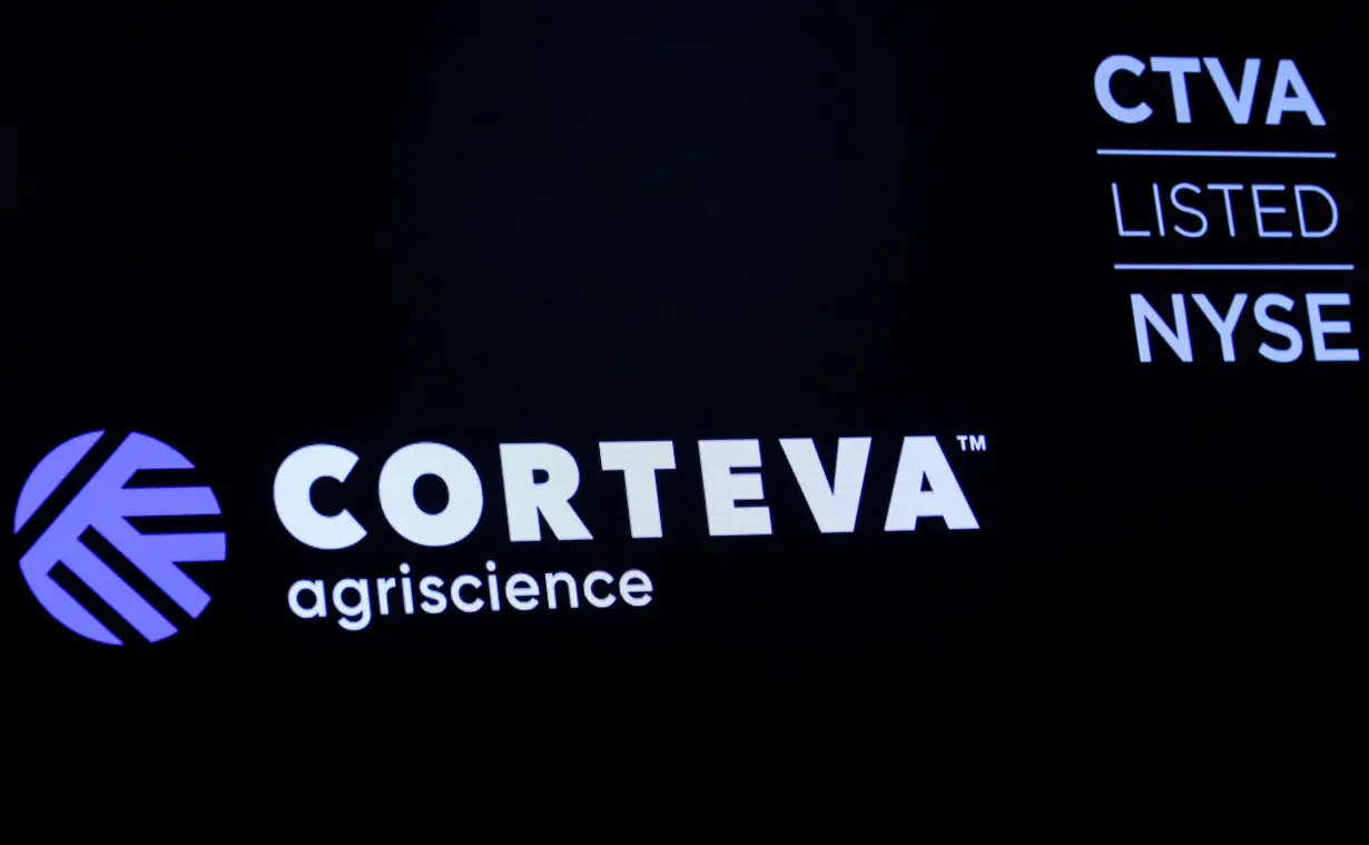 FILE PHOTO: The logo and trading info for Corteva Agriscience, a former division of DowDuPont, is displayed on a screen at the NYSE in New York