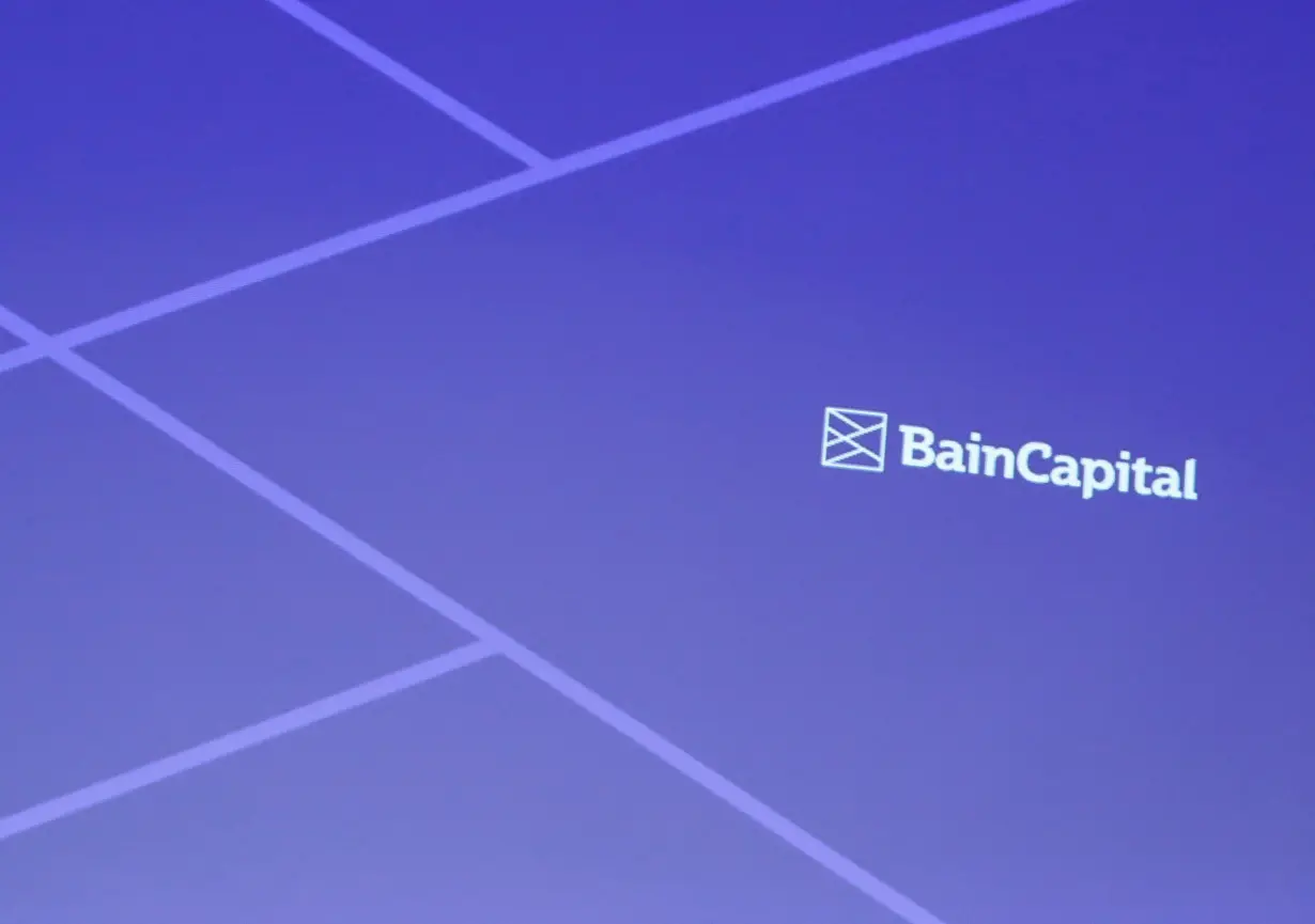 FILE PHOTO: Logo of Bain Capital is screened at a news conference in Tokyo, Japan