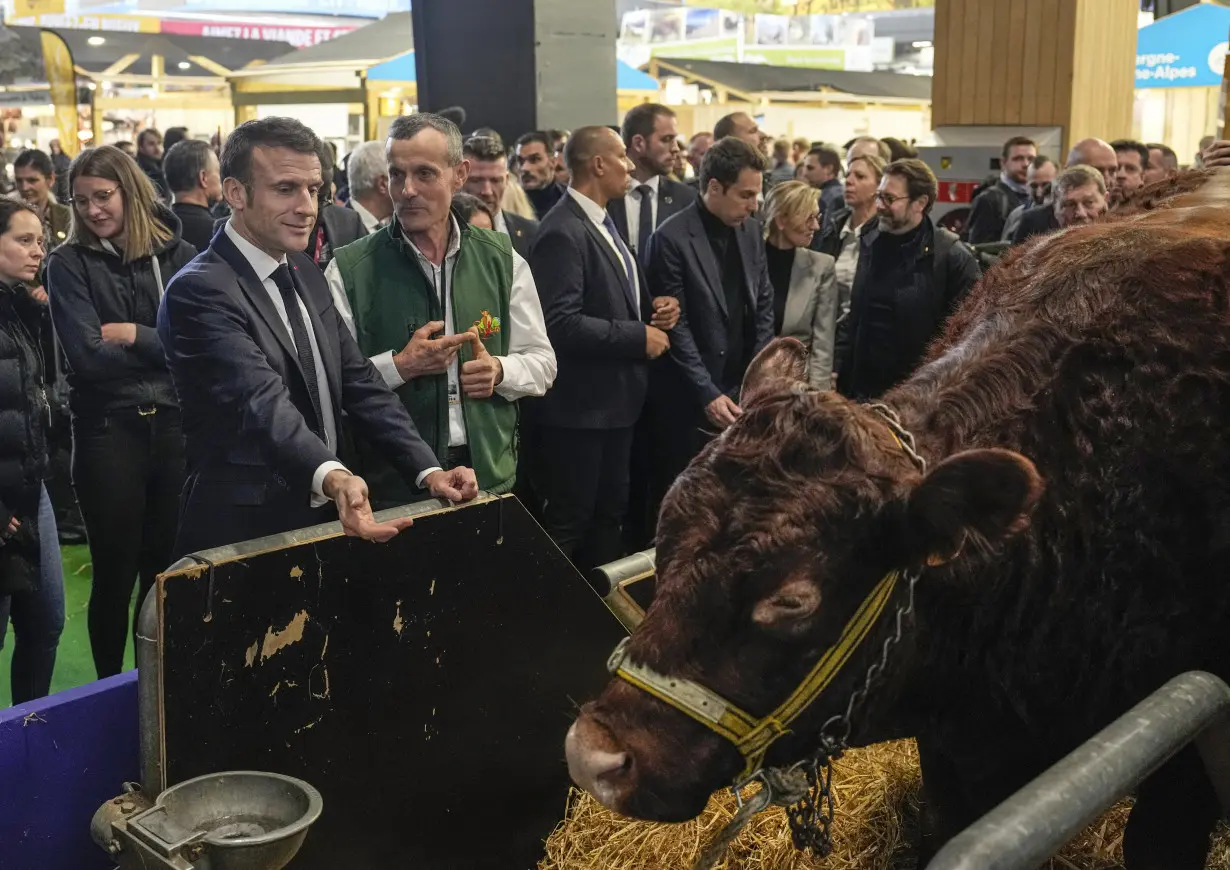 Macron booed by French farmers who blame him for not doing enough to support agriculture