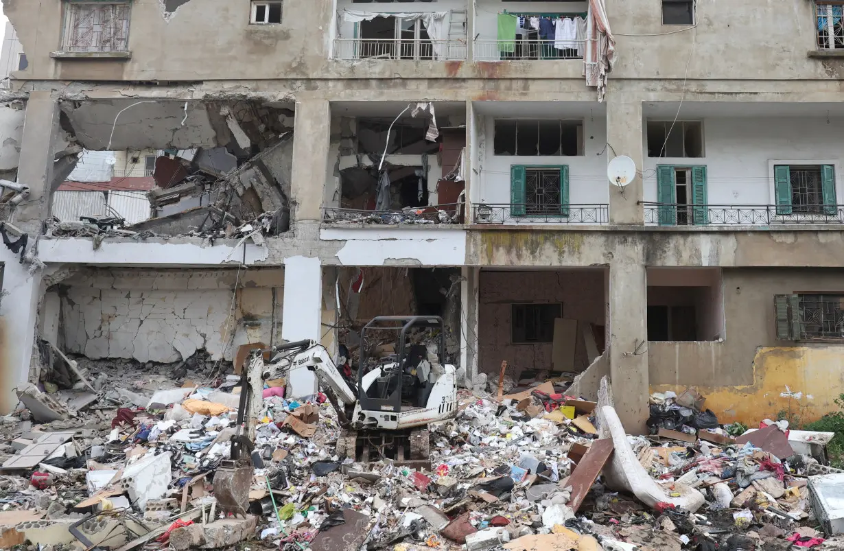 Debris is seen near a damaged building after what security sources said was an Israeli strike in Nabatieh