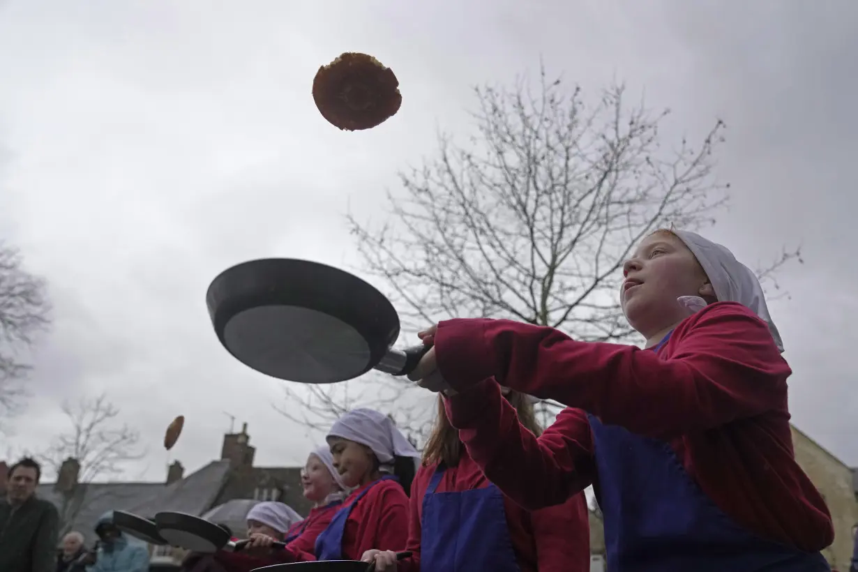 In this centuries-old English pancake race, 'you just have to go flat out'