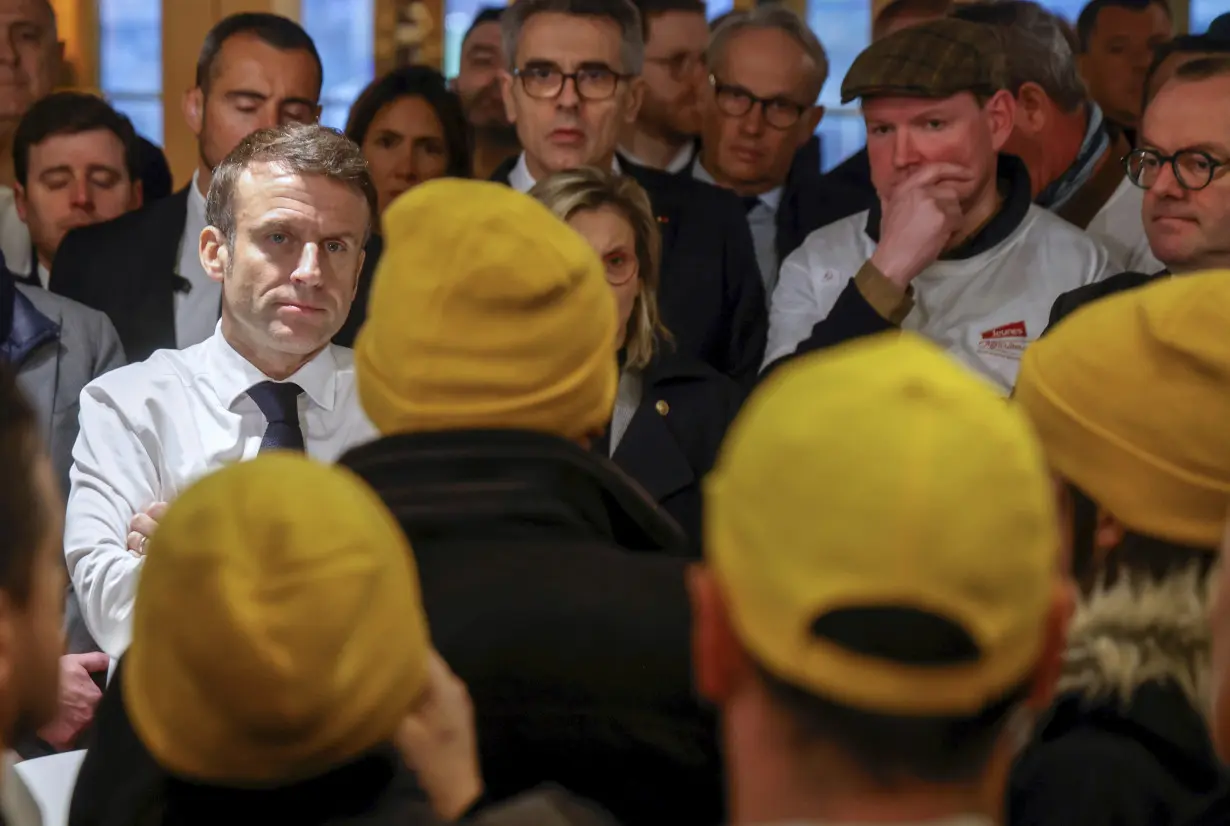 Macron booed by French farmers who blame him for not doing enough to support agriculture