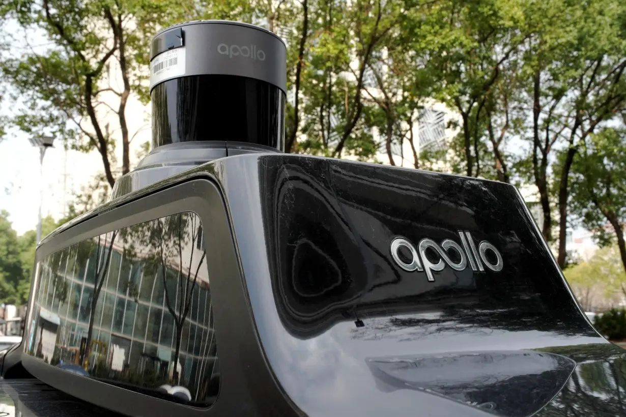 FILE PHOTO: Baidu's driverless robotaxi service Apollo Go in Wuhan