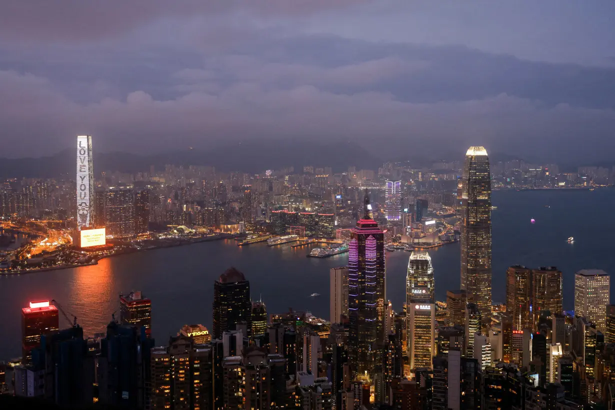 FILE PHOTO: An evening view of the financial Central district and Victoria Harbour in Hong Kong