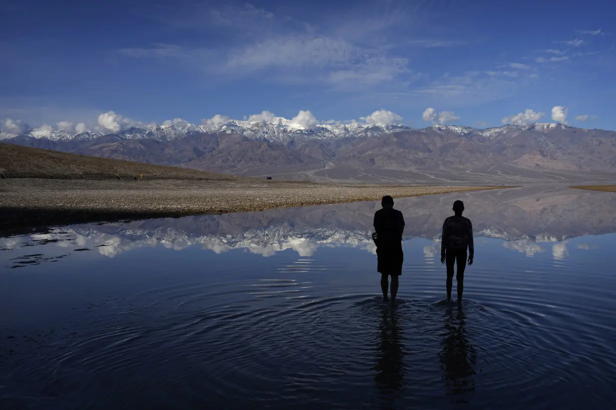 Kayakers paddle in Death Valley after rains replenish lake in one of Earth's driest spots