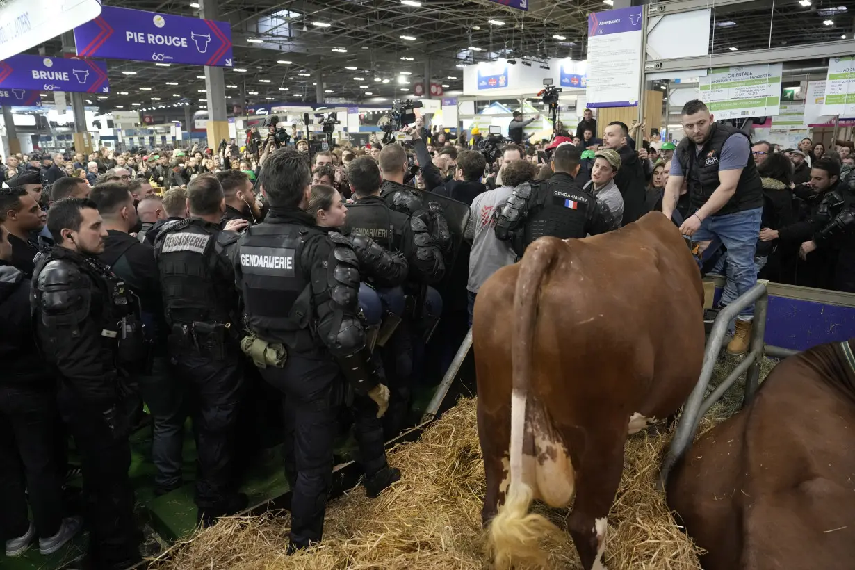 Macron booed by French farmers who blame him for not doing enough to support agriculture