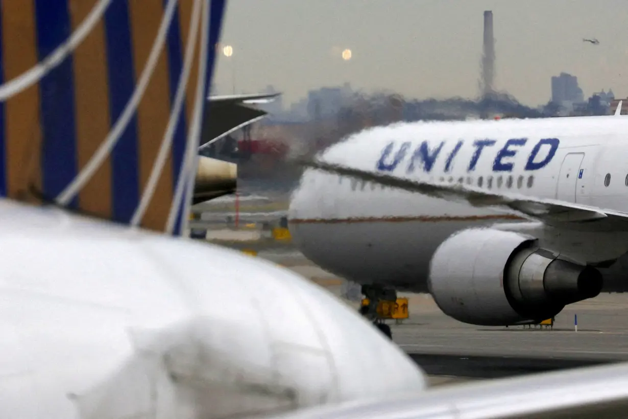 FILE PHOTO: A United Airlines passenger jet taxis at Newark Liberty International Airport, New Jersey, U.S.