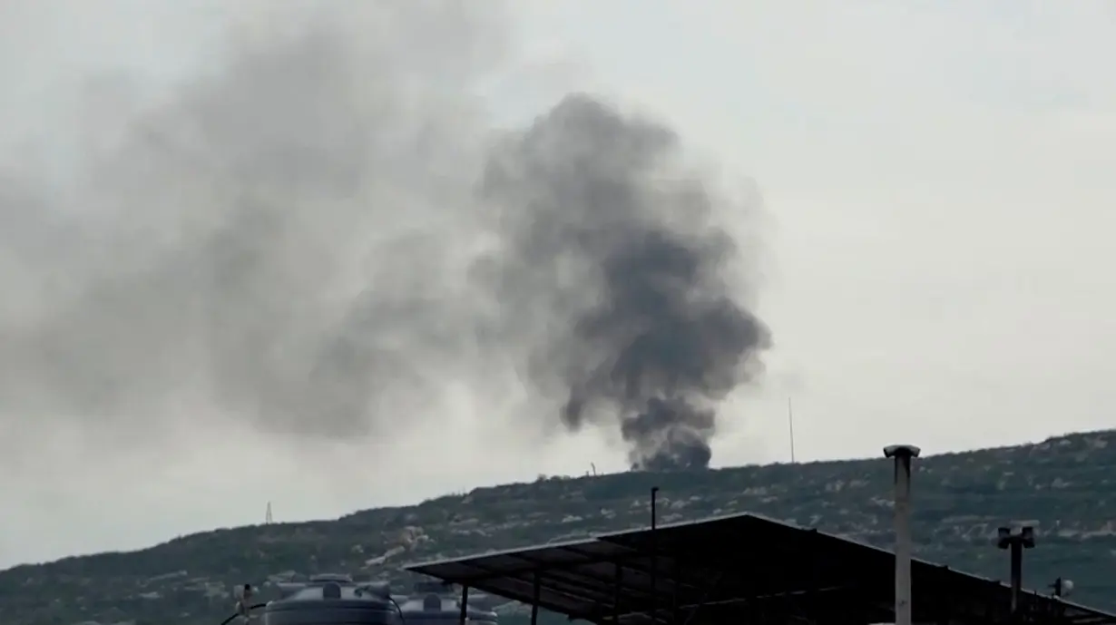 FILE PHOTO: Smoke rises from a site believed to have been hit by an Israeli strike, in southern Lebanon