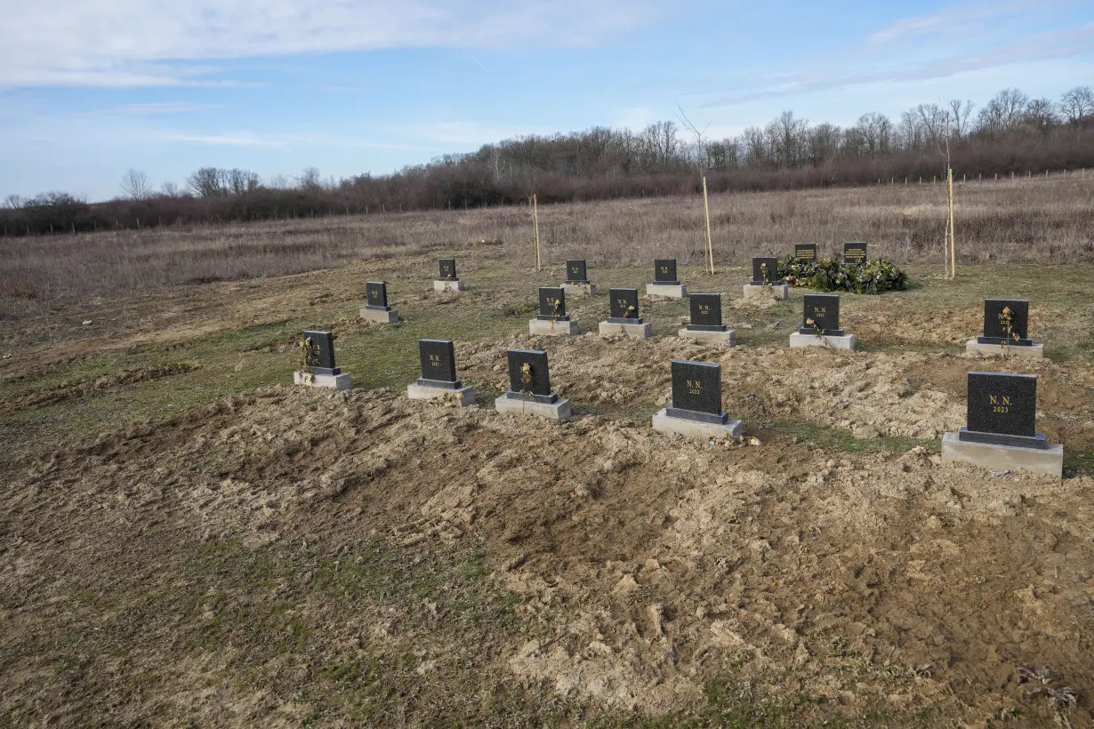 Migrants from Africa and Mideast who died in Bosnia get marble headstones and a memorial