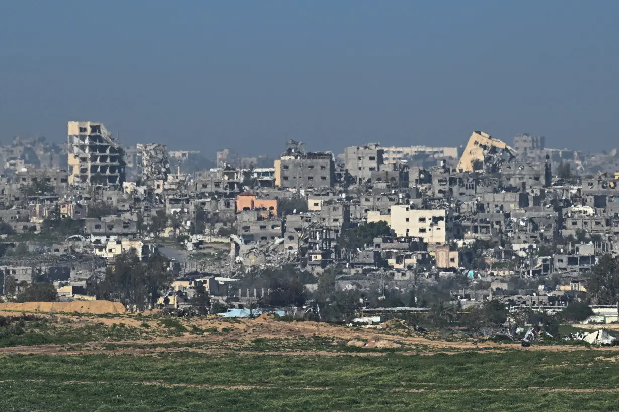 Buildings lie in ruin in Gaza, amid the ongoing conflict between Israel and the Palestinian Islamist group Hamas, as seen from Israel