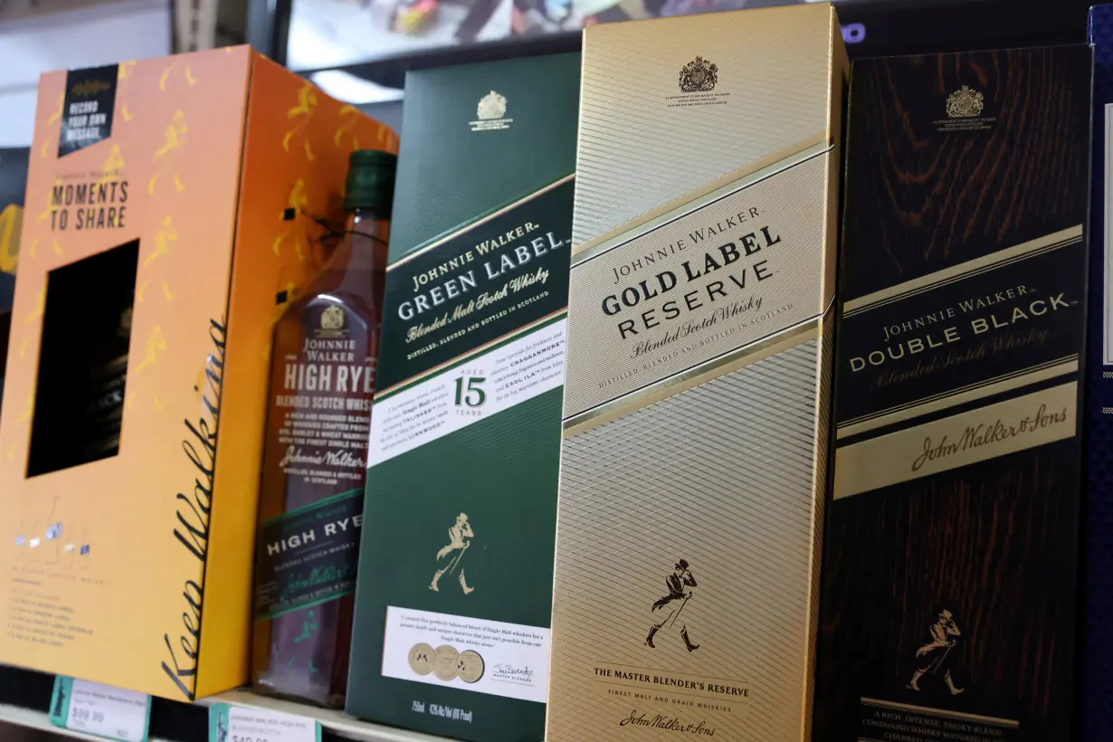 FILE PHOTO: Bottles of Johnnie Walker whisky, a brand of Diageo, are seen for sale in Manhattan, New York City