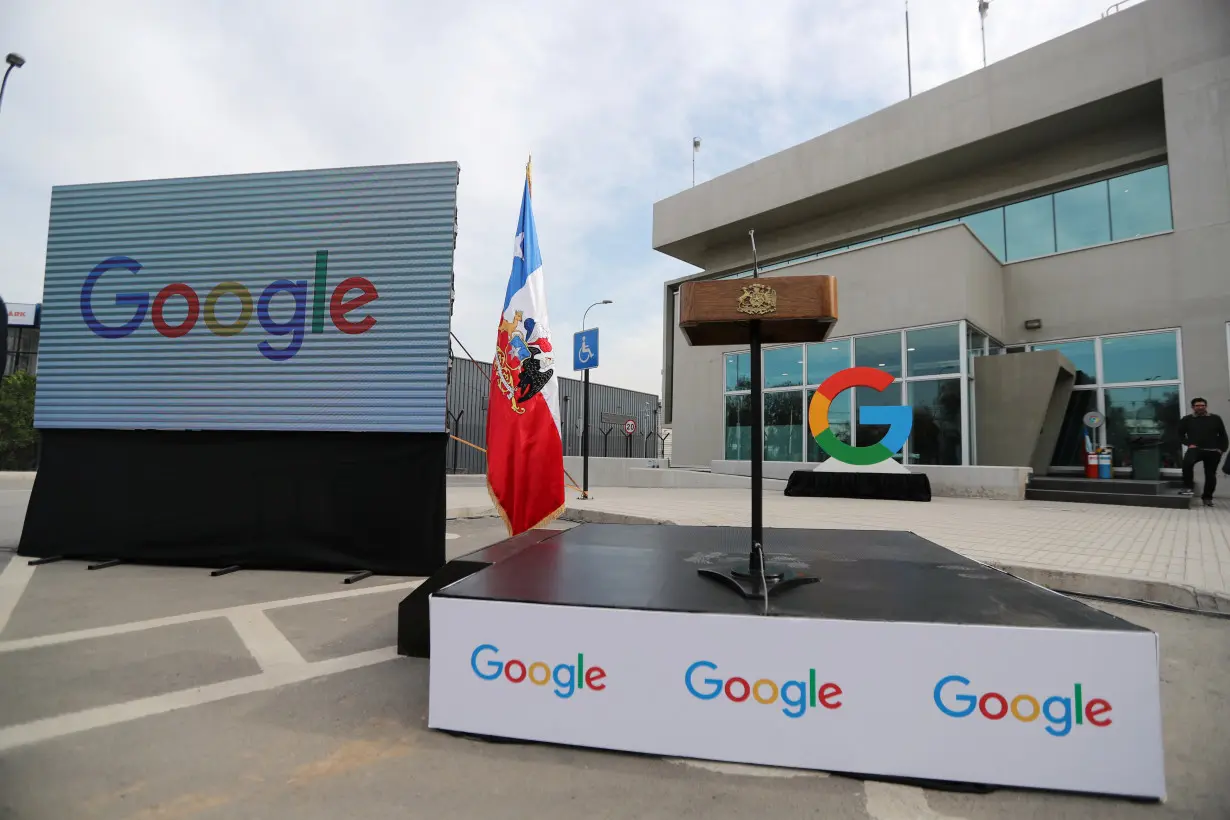 Google logos are seen during the announcement of the plans for their data centre expansion in Santiago