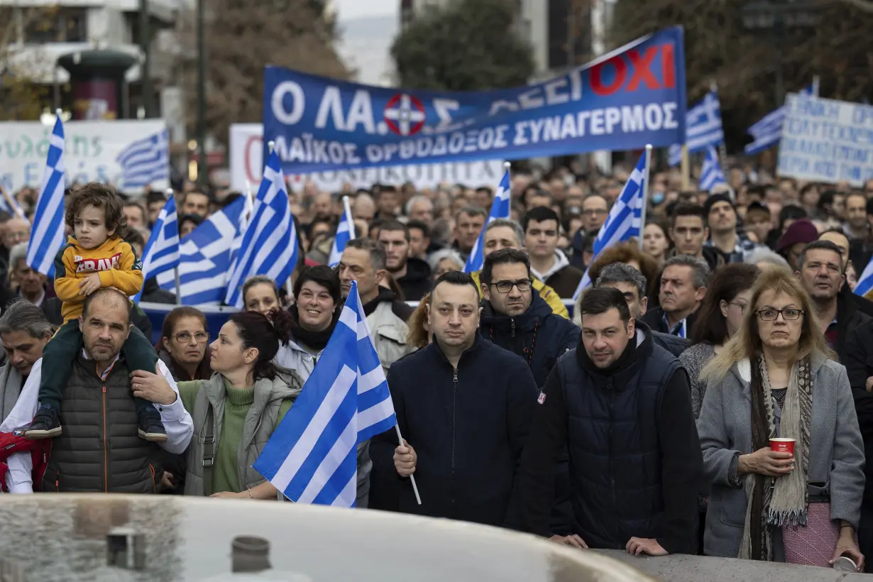 Hundreds of protesters opposed to bill allowing same-sex marriage rally in Greek capital