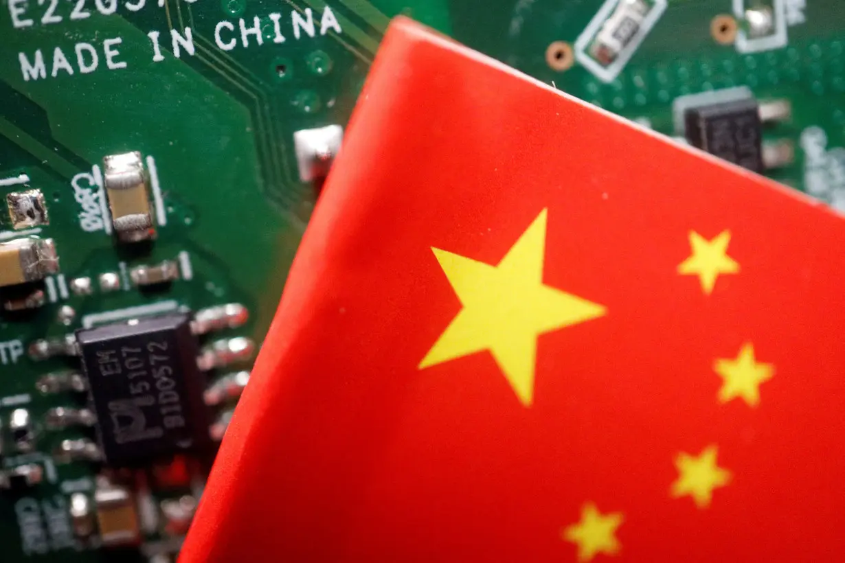 FILE PHOTO: Illustration picture of Chinese flag with semiconductor chips