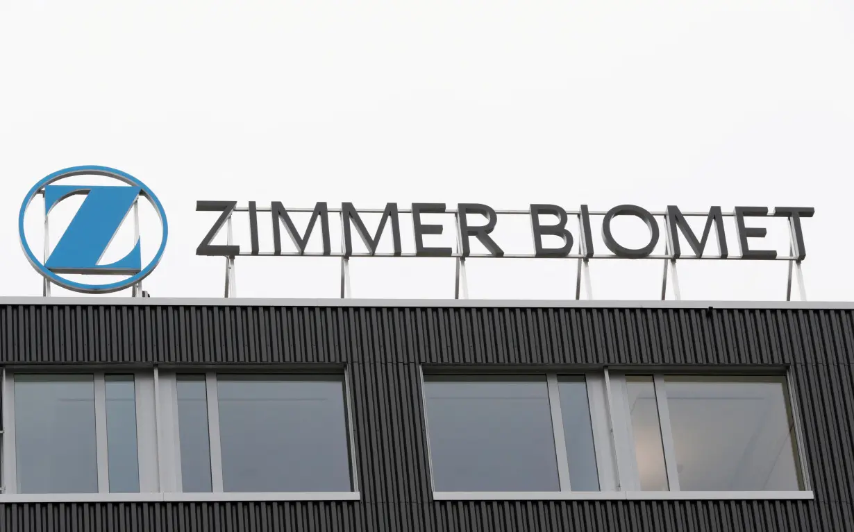 FILE PHOTO: The logo of medical implants maker Zimmer Biomet is seen at a plant in Winterthur