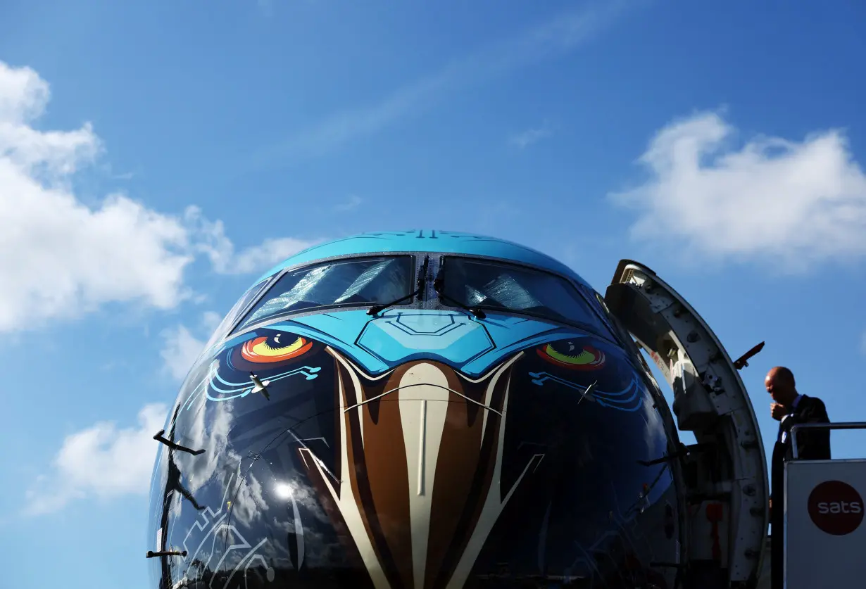 An Embraer E195-E2 Profit Hunter plane is displayed at the Singapore Airshow at Changi Exhibition Centre in Singapore