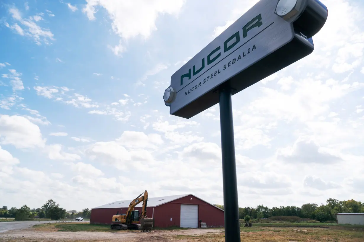 A sign for the Nucor Steel Mill, under construction, is seen in Sedalia