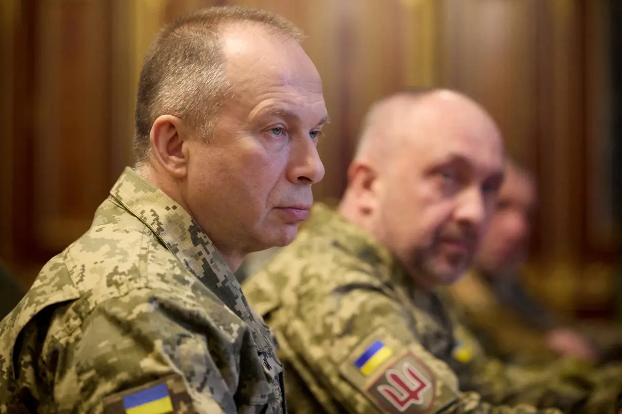 FILE PHOTO: Ukraine's President Zelenskiy attends a meeting with newly appointed top military commanders in Kyiv