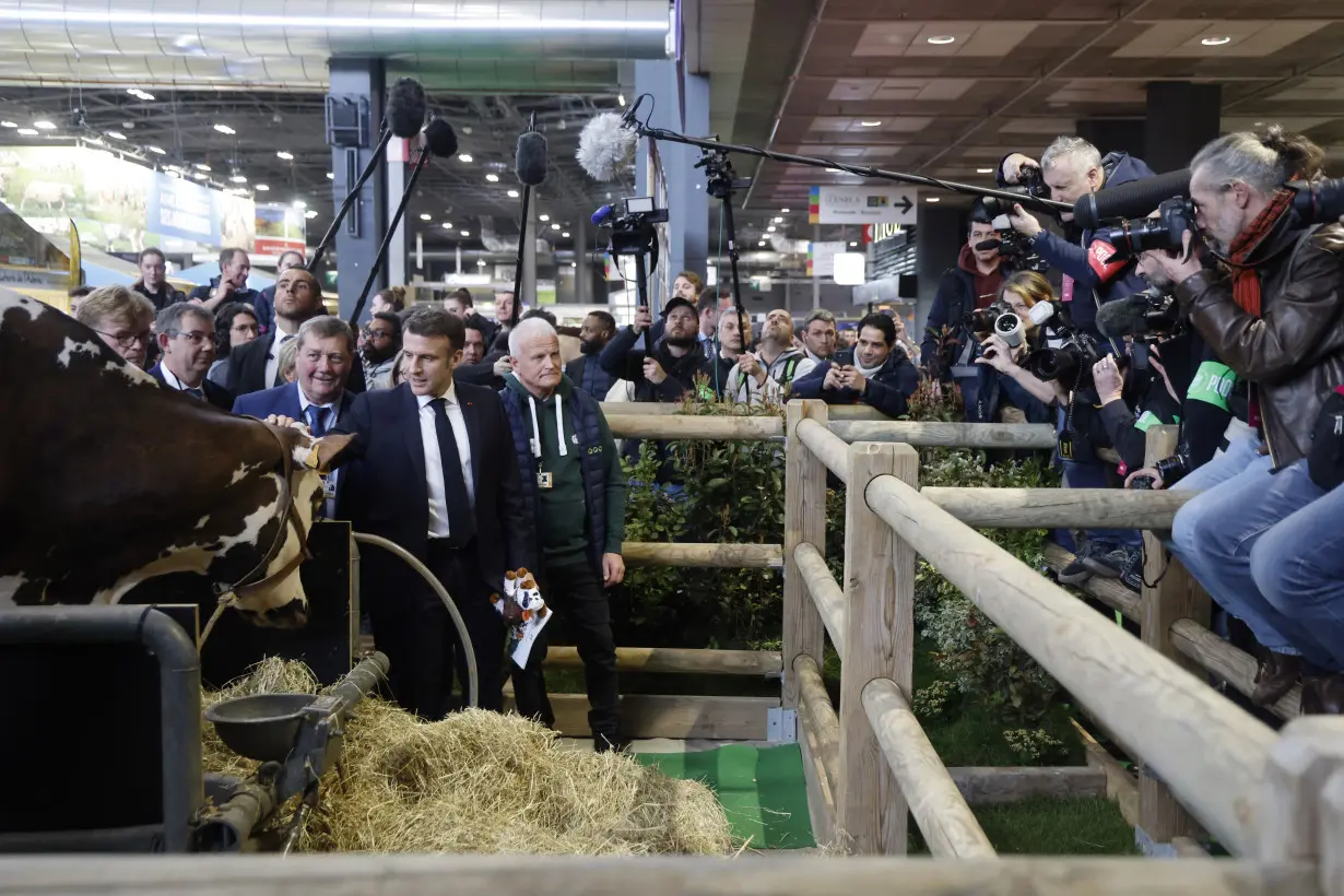 Macron booed by French farmers who blame him for not doing enough to support agriculture