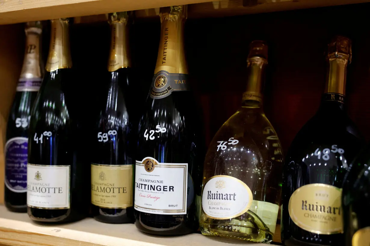 FILE PHOTO: Bottles of Champagne in a wine shop in Paris