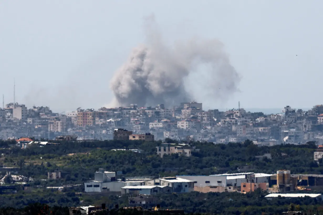 Smoke rises over Gaza, as seen from Israel