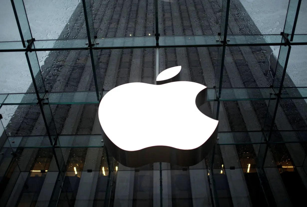 FILE PHOTO: The Apple Inc. logo is seen in the lobby of New York City's flagship Apple store